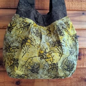 Cotton bag in brown and yellow with swallows, new condition